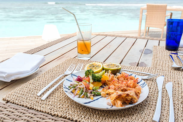 Romantic dinner by the sea with copy space