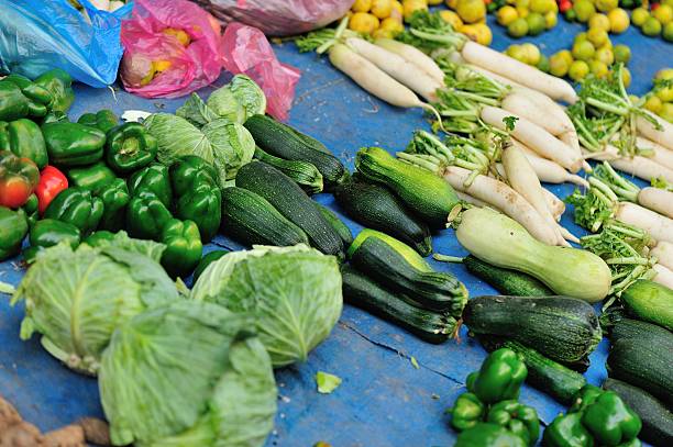 istock fresh cabbage selling at market 627305218
