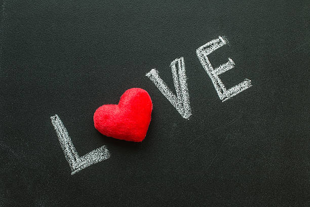 istock Love Hand writes on the chalk board 627306644