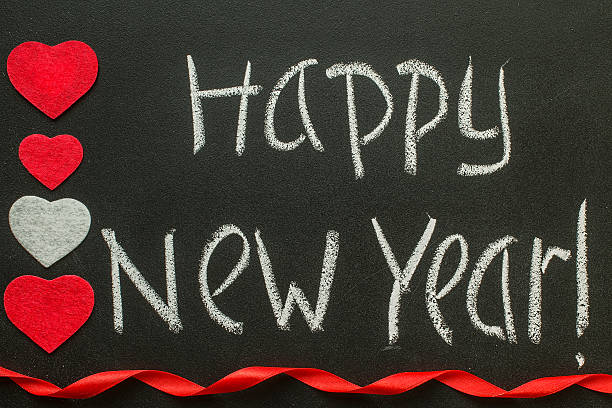 istock Happy New Year  handwriting on a blackboard. 627306762