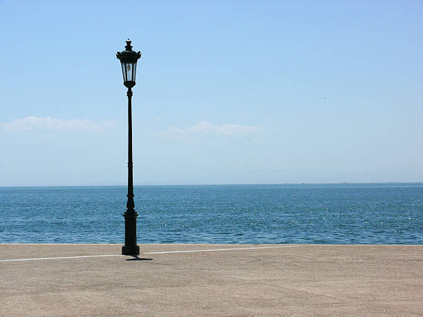istock Lamppost by the sea 627306850