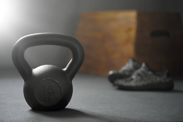 istock Close up of kettlebell weights on floor gym. 627306856