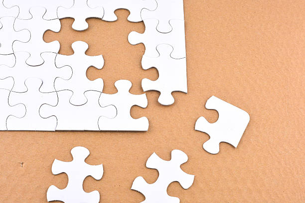 istock Puzzle on brown background. Team business concept 627306866