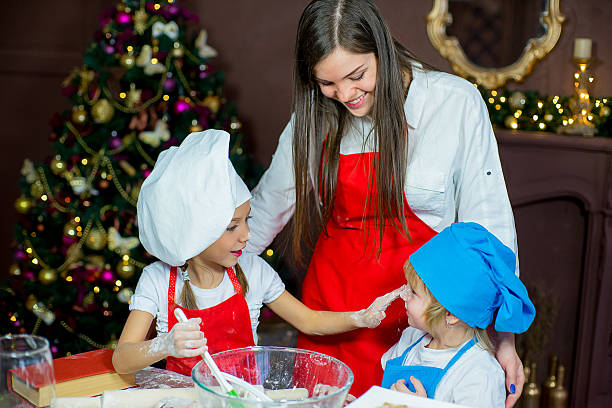 istock children baking christmas cookies 627312340