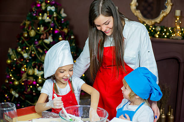 istock children baking christmas cookies 627312856