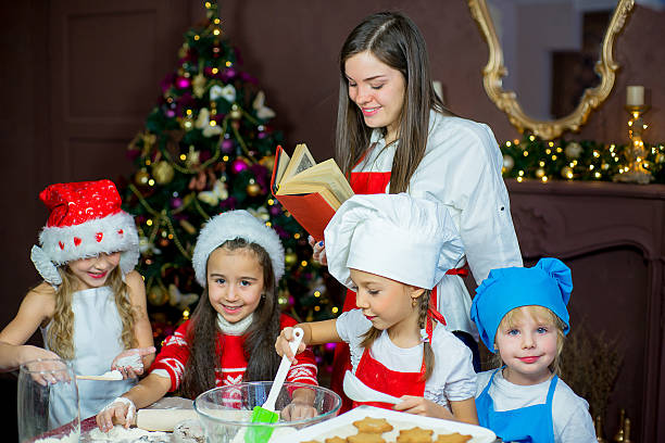 istock children baking christmas cookies 627314332