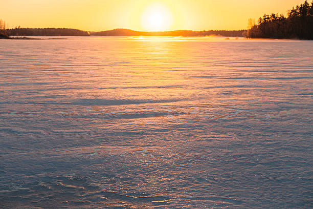 istock Sunset winter landscape with snow-covered field. 627317512