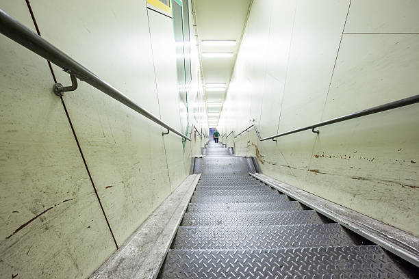 istock an metal staircase in a tunnel 627317740