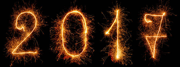 istock Bright sign sparklers 2017 isolated on the black 627318174