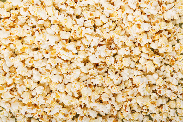 istock Background. Delicious salty popcorn 627319104