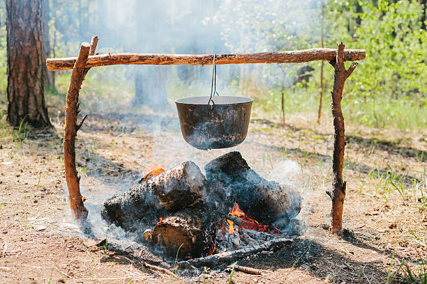 istock The fire near the camp. Cooking food on a fire. 627320552