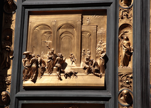 The Gates of Paradise detail. Bronze door by Lorenzo Ghiberti, Florence, Italy