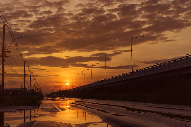 Reflection sunrise on the road. stock photo