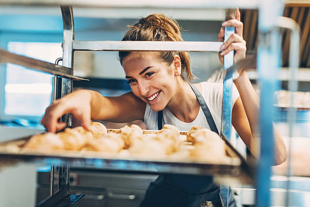 Checking the freshly baked croissants