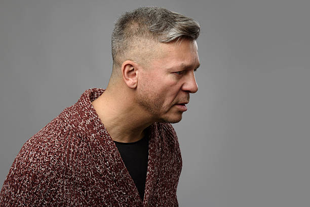 istock Studio shot of serious mid age man 627338404