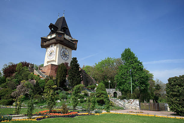 tour de l'horloge de graz - graz clock tower clock austria photos et images de collection