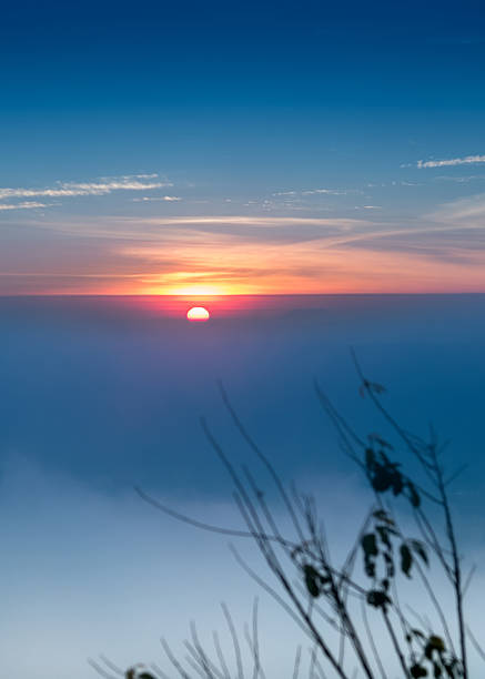 istock foggy sunrise landscape in the morning. 627340372
