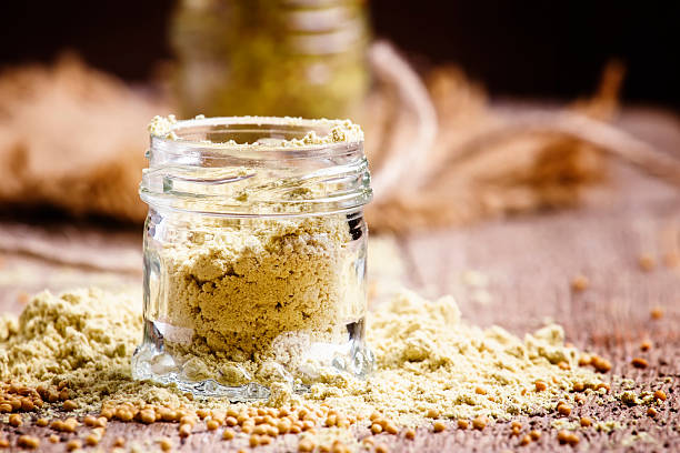 istock Mustard powder in a glass jar 627340692