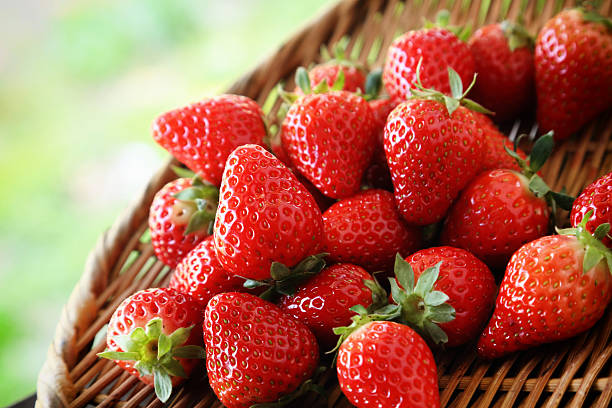 istock Fresh red ripe strawberries isolated on white 627341378
