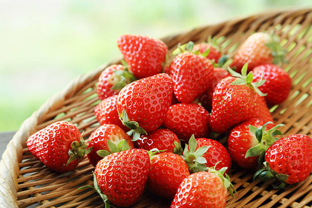 istock Fresh red ripe strawberries isolated on white 627341424