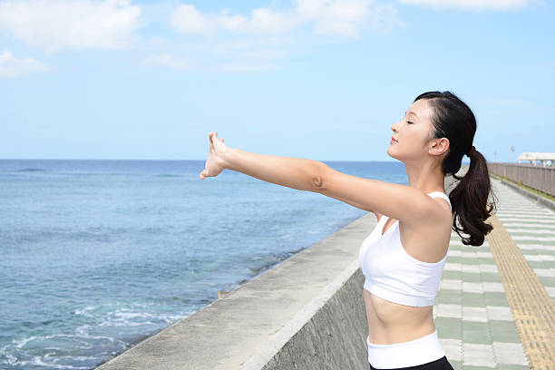 istock Relaxed woman by the sea 627343254