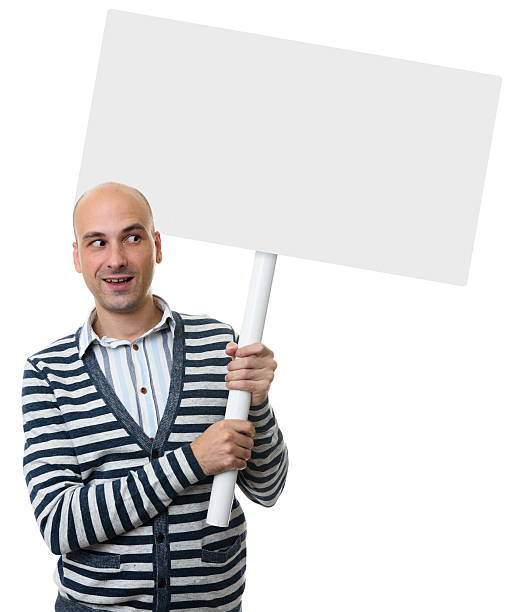 istock casual bald man holding placard on a stick 627345152