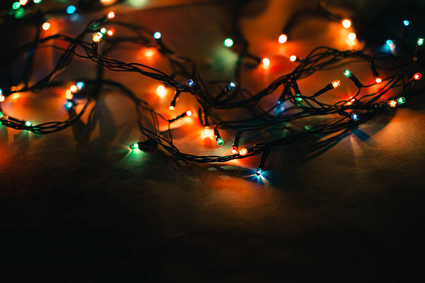 istock Christmas lights on a black background 627351010