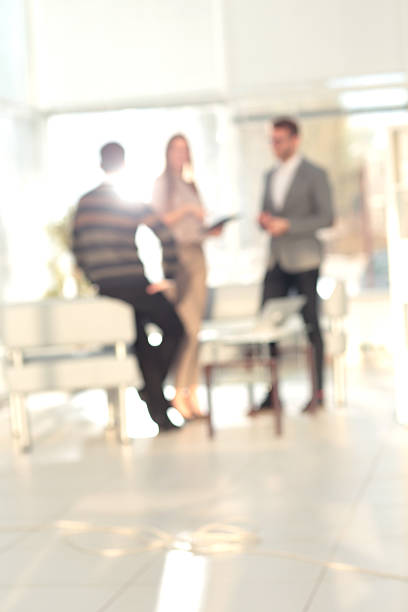 istock Blurred abstract background of business discussion people group. 627352056