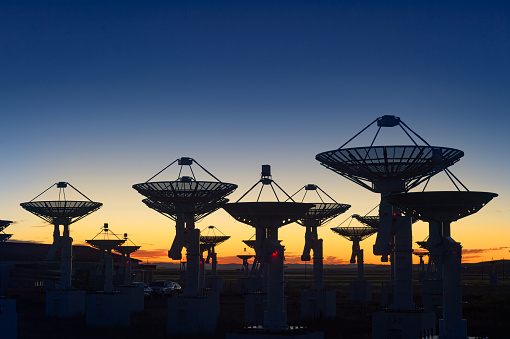 Antena del observatorio en la puesta de sol photo