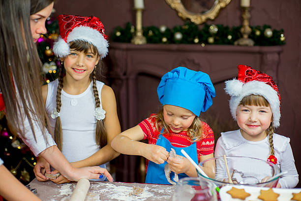 istock children baking christmas cookies 627355216
