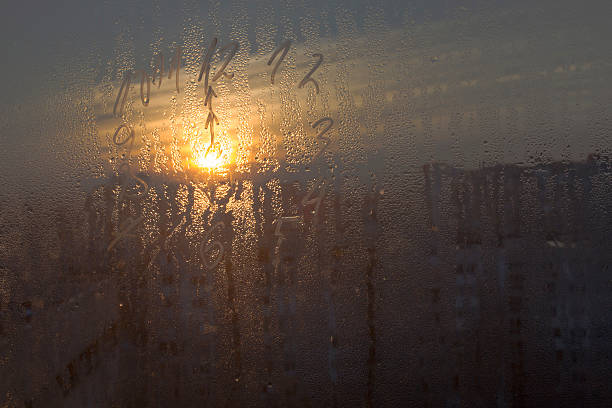 istock Wet from rain window with the cityscape background 627355418