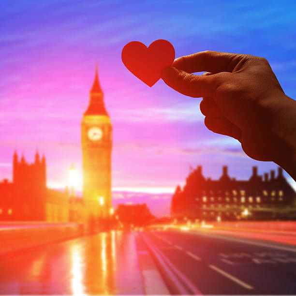 istock silhouette of romantic lovers hand 627355774