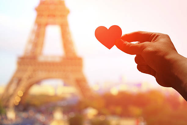istock silhouette of romantic lovers hand 627355804