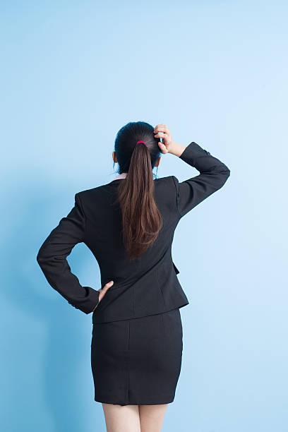 istock business woman back to you 627364522