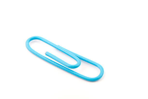 Blue paper clip isolated on white background.