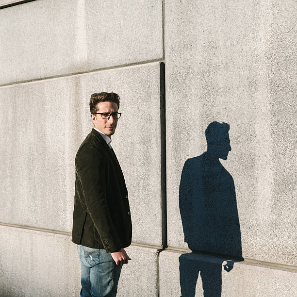 istock Young handsome man posing in an urban context 627370630