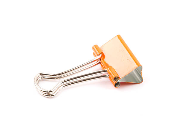istock Orange color Paper clip isolated 627371456