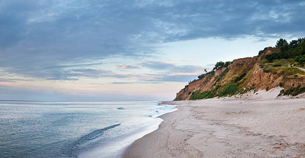 Cliffed coast of the Black Sea in Ukraine Cliffed coast of the Black Sea in Odessa Region in Ukraine. odessa beach stock pictures, royalty-free photos & images