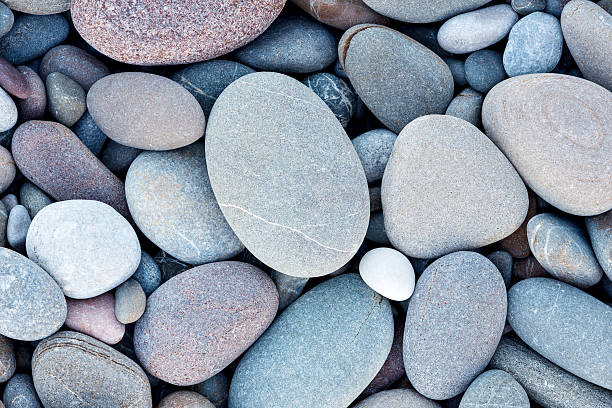 Abstract smooth round pebbles sea texture background Abstract smooth round pebbles sea texture background pebble stock pictures, royalty-free photos & images