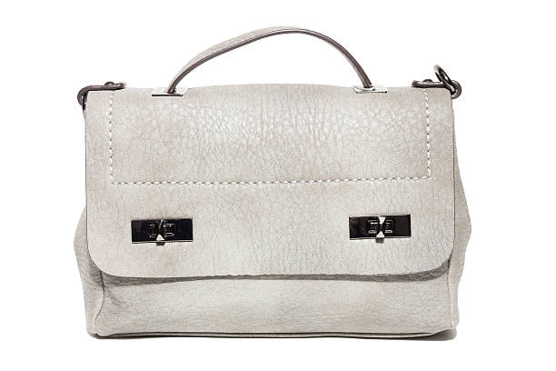 istock female handbag on a white background 627379418