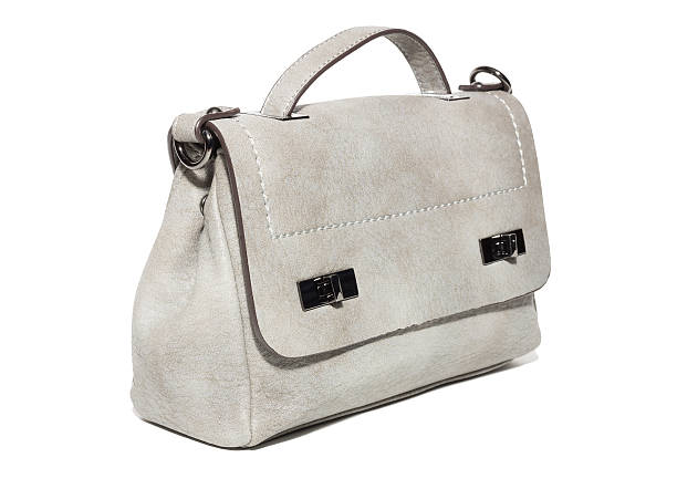 istock female handbag on a white background 627379592