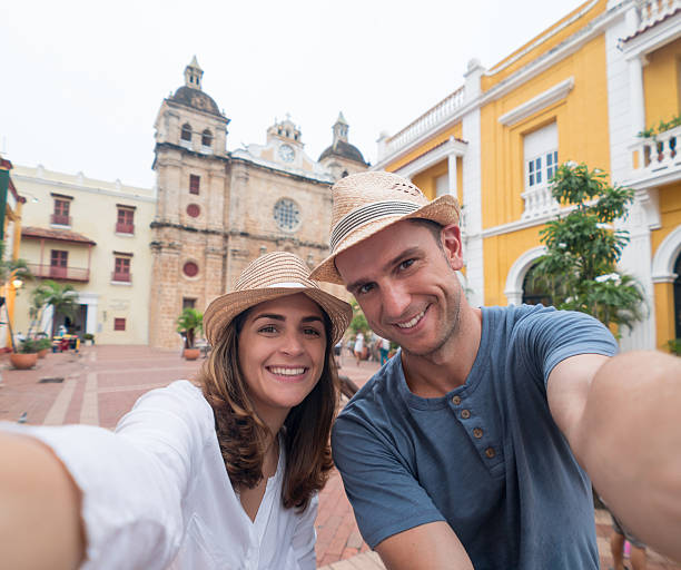 istock Couple on vacation taking a selfie 627380292