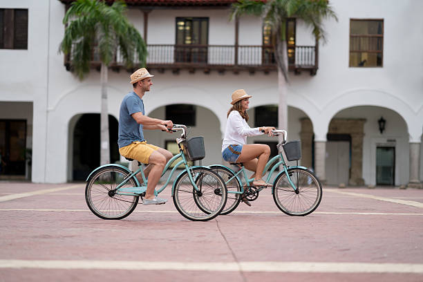 istock Tourists sightseeing in Cartagena on bikes 627380346