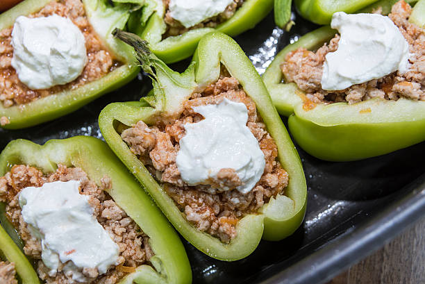istock Peppers and tomatoes stuffed with meat 627380388