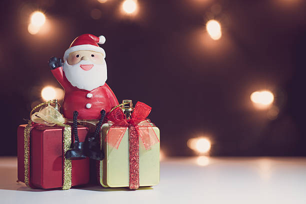 istock Santa Claus dolls and Christmas decorations box 627380928