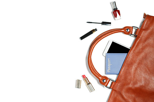 istock Woman bag stuff isolated on white background 627390056