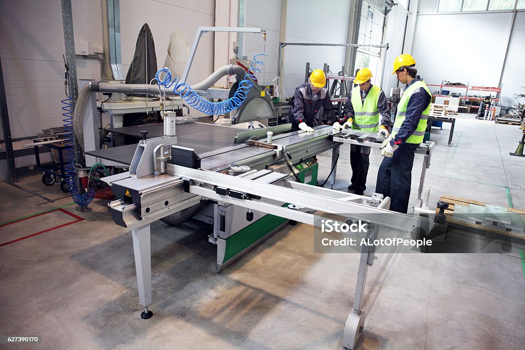 CNC machine shop CNC machine shop with lathes, technicians and workers Factory Stock Photo