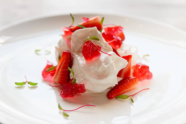 istock Meringue dessert with strawberries and jam 627398450