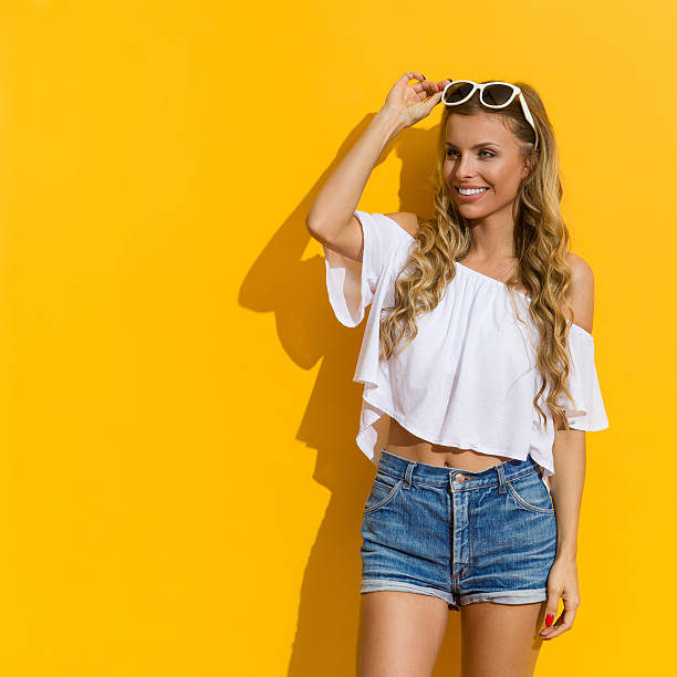 istock Woman In Sunlight Looking Away 627399556
