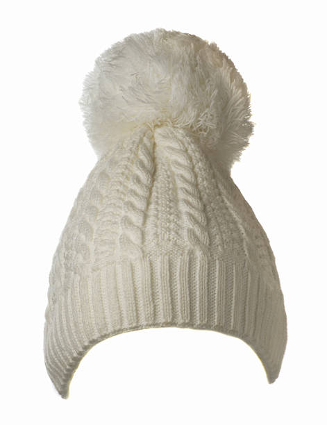 istock Women's knitted hat isolated on white background.hat with pomp 627400076